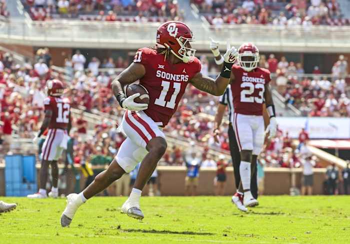 Sep 4, 2021; Norman, Oklahoma, USA; Oklahoma Sooners linebacker Nik Bonitto (11) recovers a fumble during the second quarter against the Tulane Green Wave at Gaylord Family-Oklahoma Memorial Stadium. Mandatory Credit: Kevin Jairaj-USA TODAY Sports